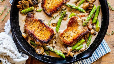 Pan Seared Pasture-Raised Pork Chops with Asparagus and Mushrooms